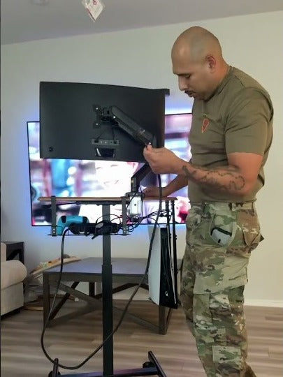 Adrian Vasquez, founder of Game Glide, assembling the first GameGlide Station